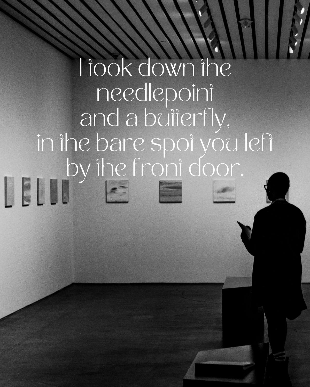 man looking at a gallery wall reciting poems about anger