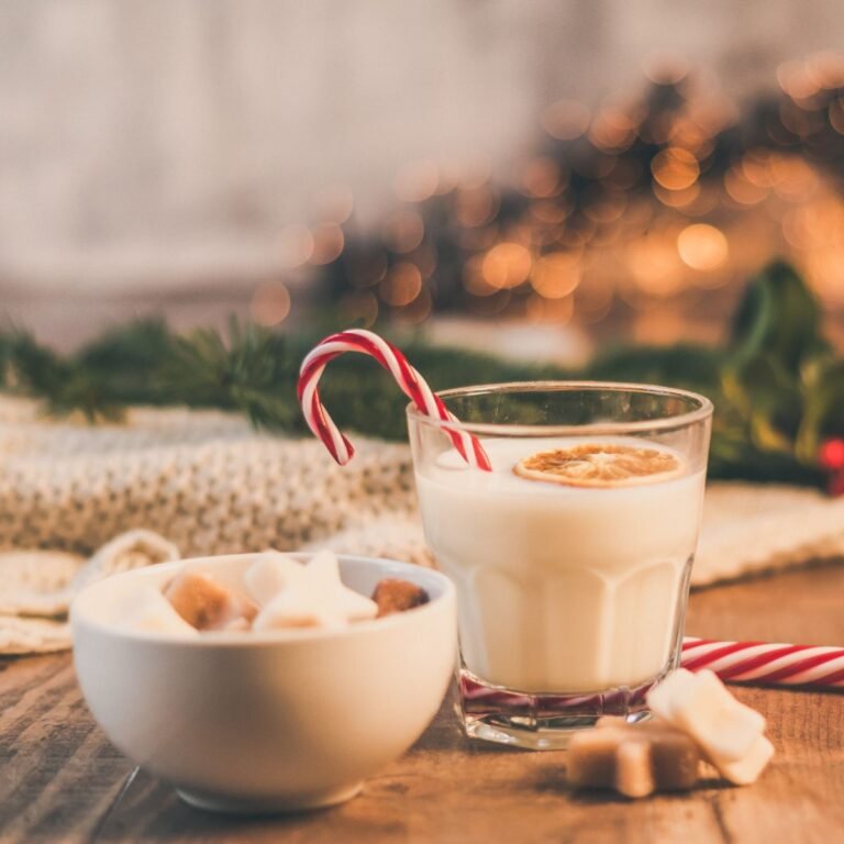 egg nog with a candy cane