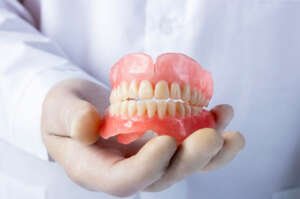 What Types of Dentures Are Available Through Online Services?